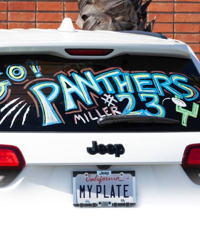 Rear window displaying "Go Panthers" using custom window markers