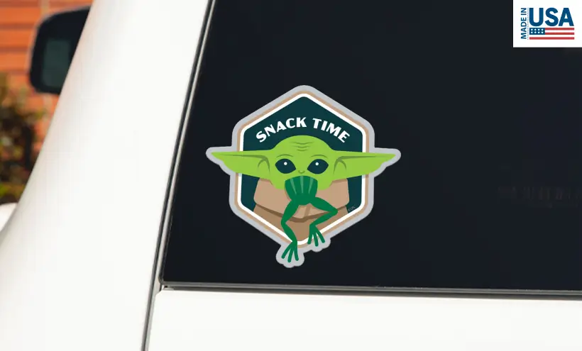 A decal of the character Grogu from Star Wars featuring the text "Snack Time"